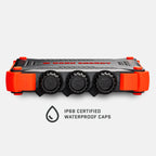 Orange and black XL power bank front view with three round output ports and waterproof caps