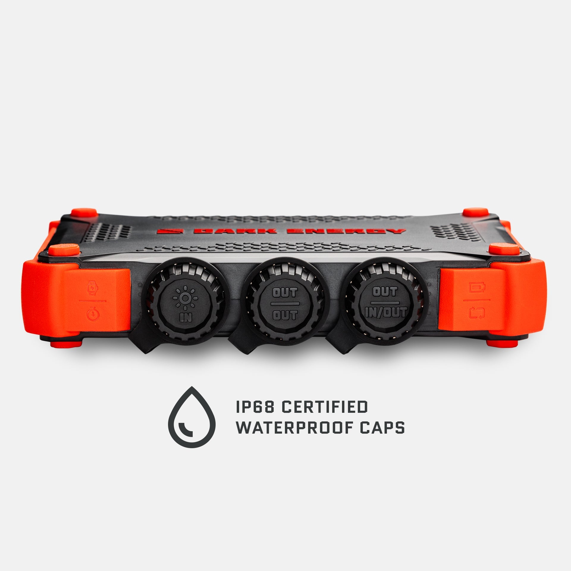Orange and black XL power bank front view with three round output ports and waterproof caps