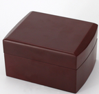 Square dark-brown gift box with hinged lid, closed