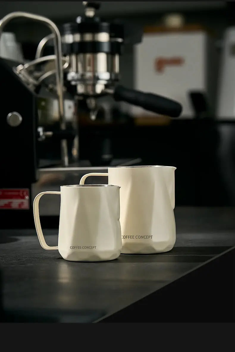 Milky white stainless milk pitcher with handle and pour spout