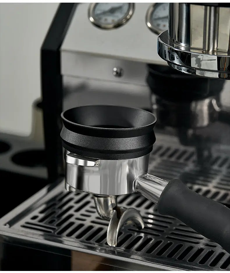 Black magnetic anti-static dosing ring fitted on a metal espresso portafilter