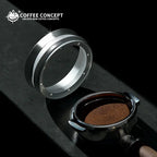 Dual-tone magnetic powder ring set: silver metal ring with black outer layer, shown from above.