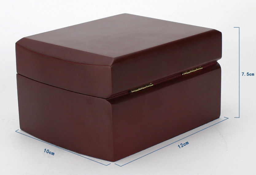 Square dark-brown gift box with gold logo strip; 12x10x7.5cm shown