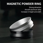 Magnetic powder ring in matte black and silver metal, stacked rings on a dark surface.