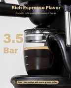 Black espresso machine front view with clear brewing carafe and 3.5 bar marking