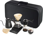 Portable pour-over coffee brewing kit in black travel bag with kettle, dripper, grinder and cups
