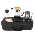Complete pour-over coffee set with stainless kettle, dripper carafe, grinder, and two cups