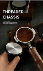 Espresso tamper base with WDT needle plate, wooden handle and metal frame close-up.