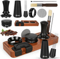 Black espresso accessory kit with tamper, tamping station, dosing tools, brush, and pen