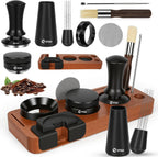 Black espresso accessory kit with tamper, tamping station, dosing tools, brush, and pen