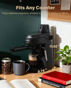 Black espresso machine on counter near mug, books, and plant, compact home size