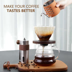 Pour-over coffee brewing kit making coffee with dripper, kettle, and hand grinder