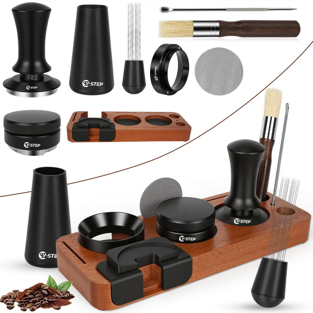 Black espresso accessory set laid out: tamper, tools, puck screen, dosing funnel, brush