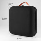Black zippered travel storage case for pour-over coffee kit with leather handle