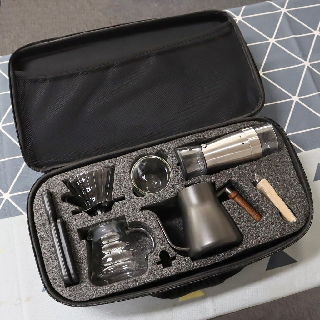 Coffee kit components in foam-lined zip travel bag: kettle, dripper, grinder, and filters