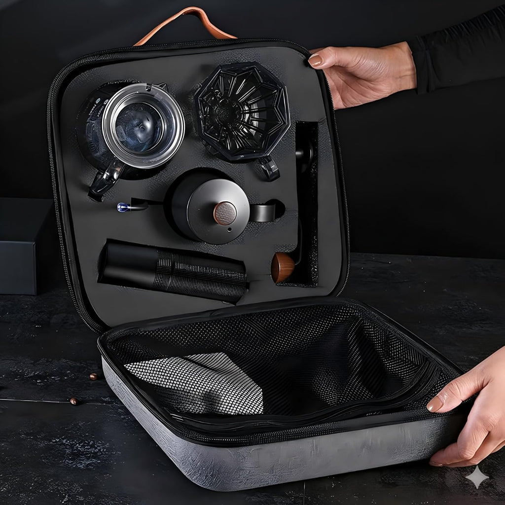 Open black travel case showing grinder, kettle, dripper, carafe, and tools