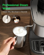 HBN steam wand frothing milk in metal pitcher beside espresso machine, stainless and black