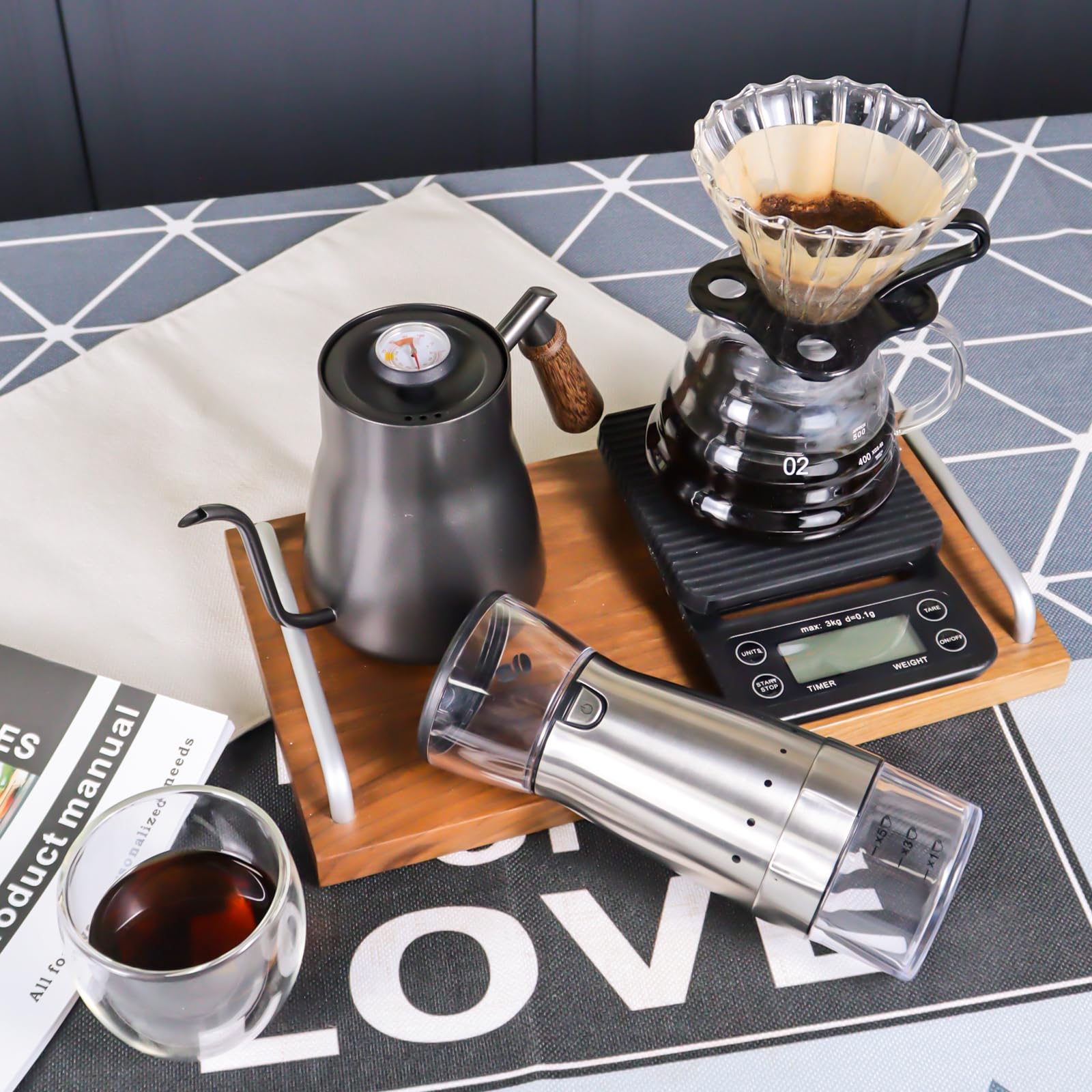 Pour-over coffee kit with stainless kettle, dripper, glass carafe, and grinder scale display