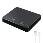 Black digital espresso scale with angled LED display, shown with USB charging cables
