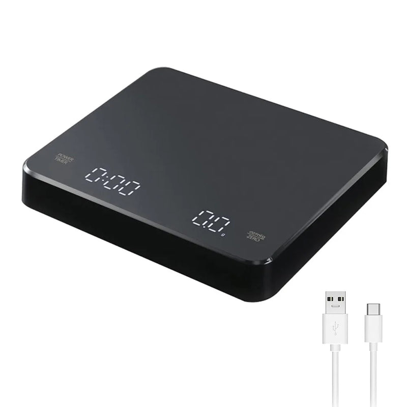 Black digital espresso scale with angled LED display, shown with USB charging cables