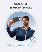 Slim 10,000mAh power bank held while charging a smartphone.