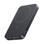 Slim wireless power bank, black with magnetic charging disc on top.