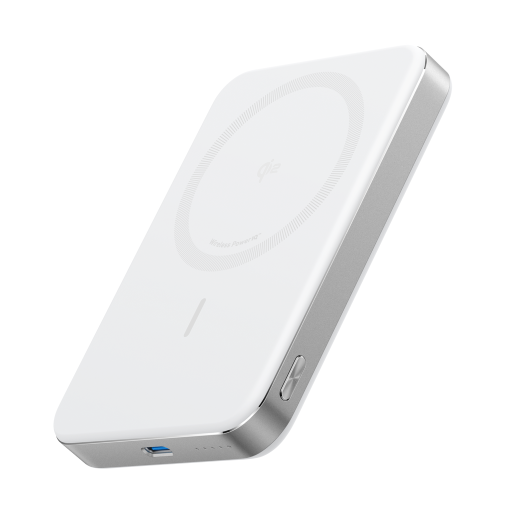Slim wireless power bank, white with magnetic charging disc on top.