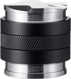 2-in-1 espresso tamper with depth indicator scale on brushed stainless top and black body.