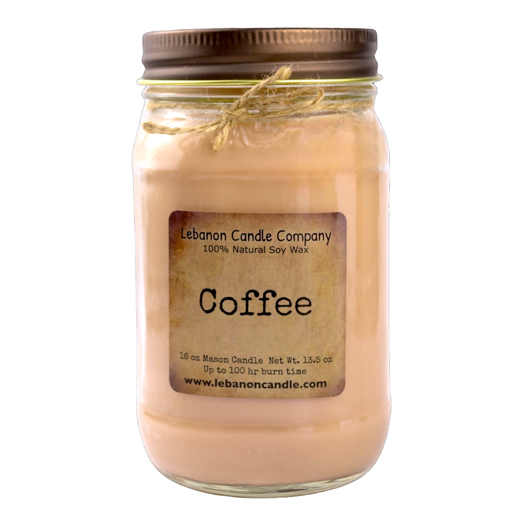 Coffee-scented soy wax candle in clear glass jar with bronze screw lid