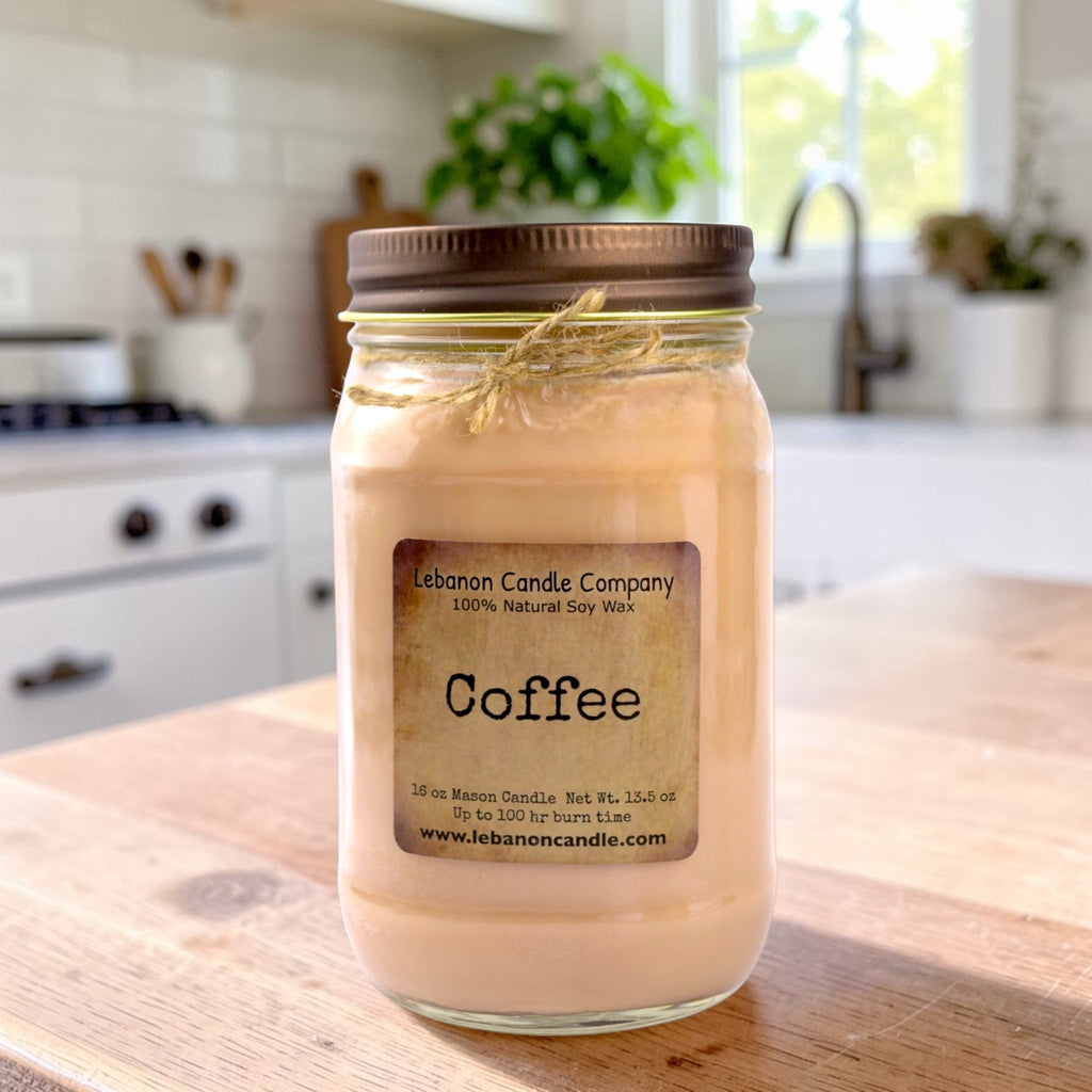 Glass jar soy candle with “Coffee” label and bronze lid