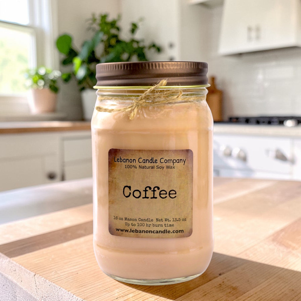Coffee-scented candle in glass mason jar, front label visible