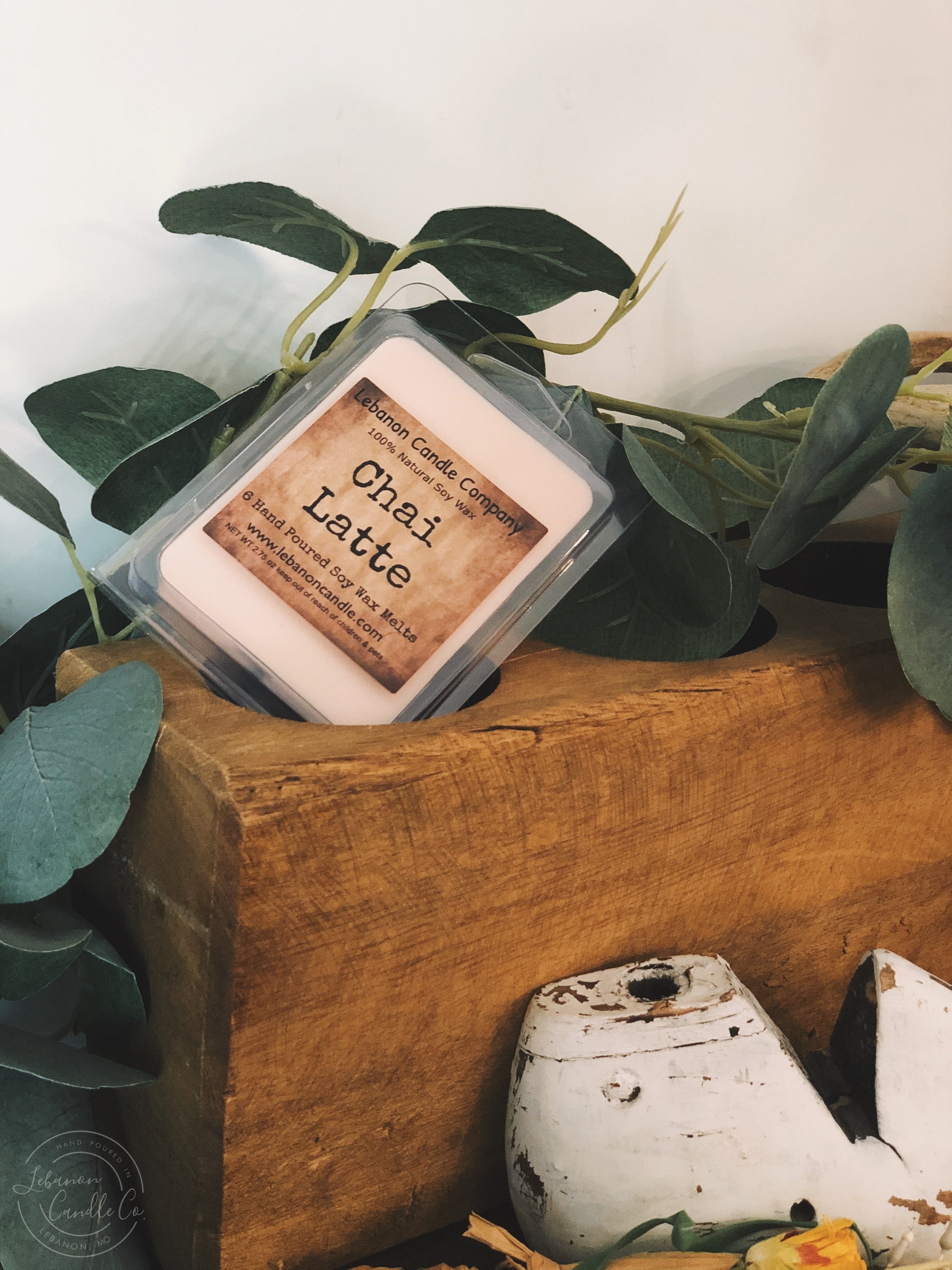 Single soy wax melt in clear tray labeled “Chai Latte” with brand text.