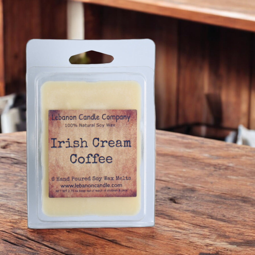 Soy wax melt clamshell with 'Irish Cream Coffee' label on a wood tabletop