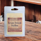 Soy wax melt clamshell with 'Irish Cream Coffee' label on a wood tabletop