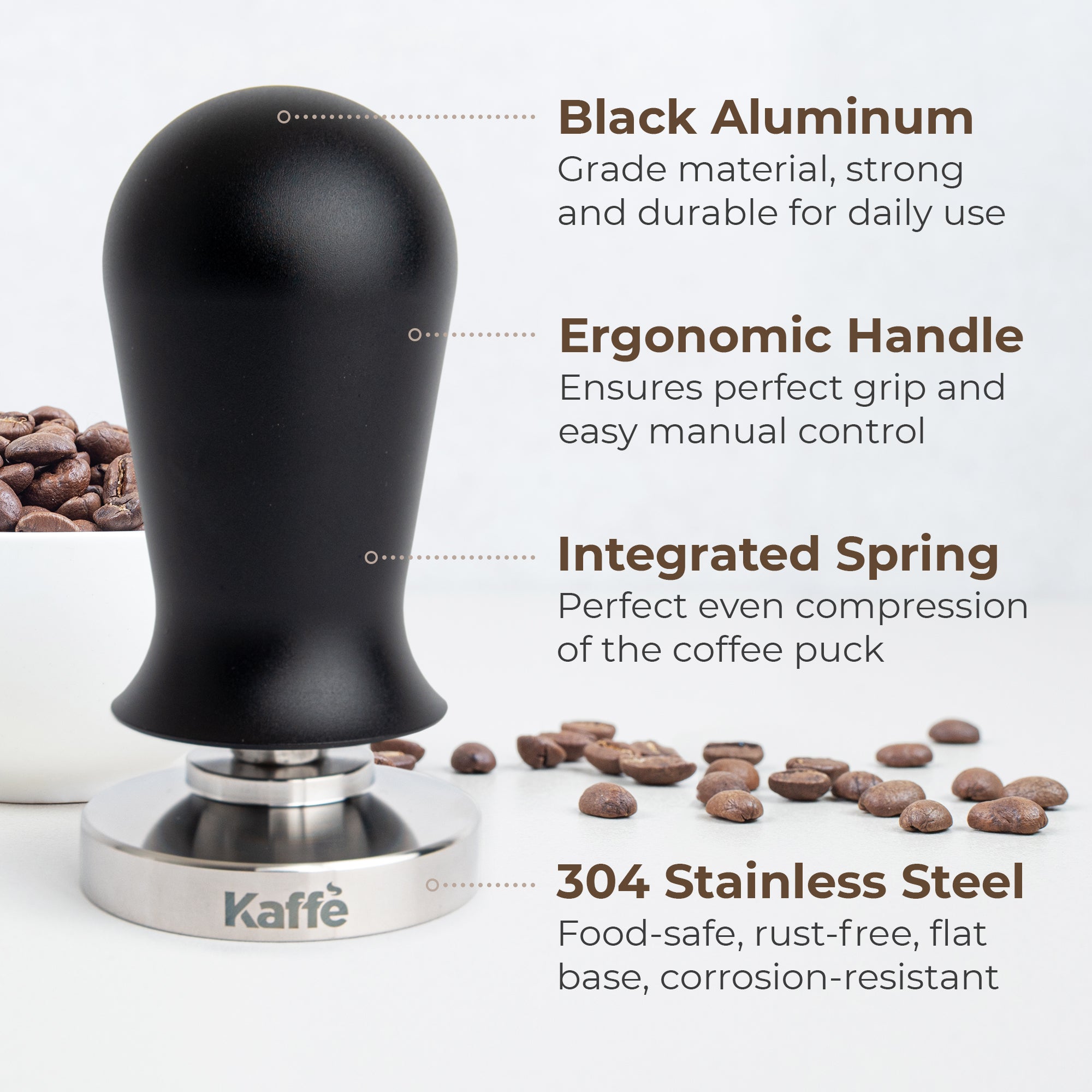 Espresso tamper with matte black handle and stainless steel base, ergonomic grip