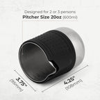 Black and stainless milk frothing pitcher with silicone sleeve and spout view