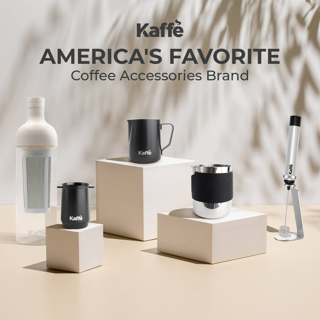 Black silicone-wrapped stainless milk frothing pitcher for espresso and latte art