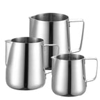 Stainless steel milk frothing pitcher trio, each with handle and spout