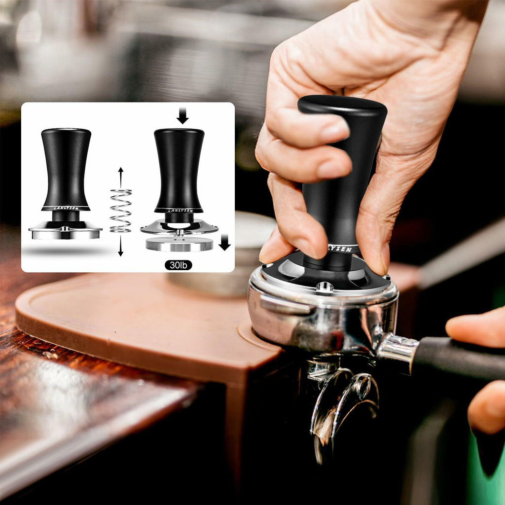 Spring-loaded espresso tamper held by hand over portafilter basket